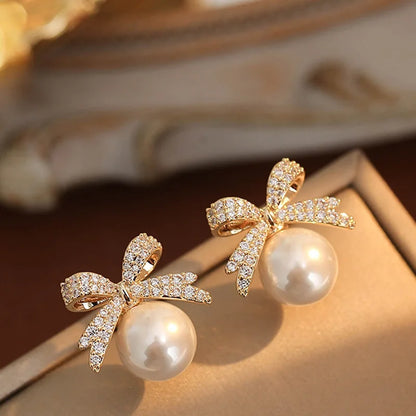 Sparkling Rhinestone Bow Pearl Stud Earrings Light Luxury