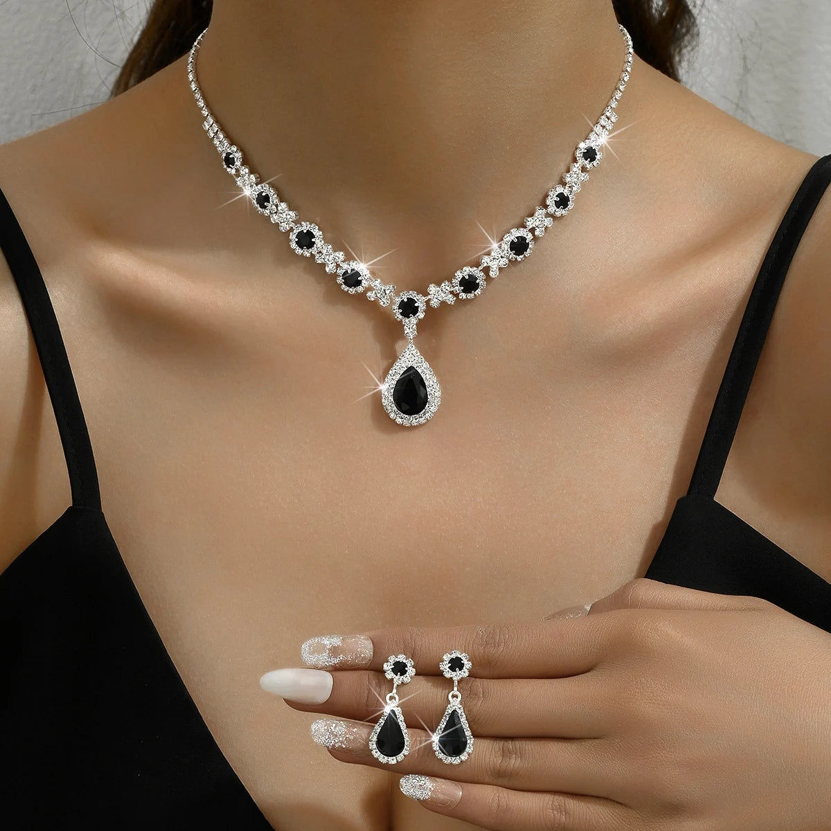 Women's crystal droplet necklace with earrings set for wedding