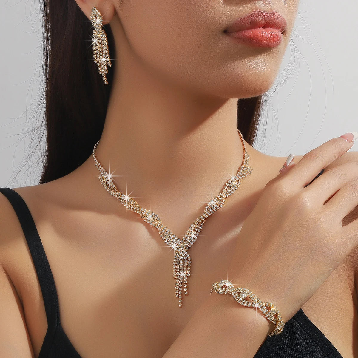 Women's Fashion Copper Claw Chain Hollow Tassel Necklace Earrings
