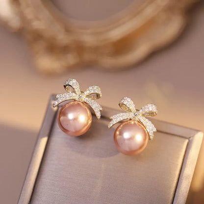 Sparkling Rhinestone Bow Pearl Stud Earrings Light Luxury