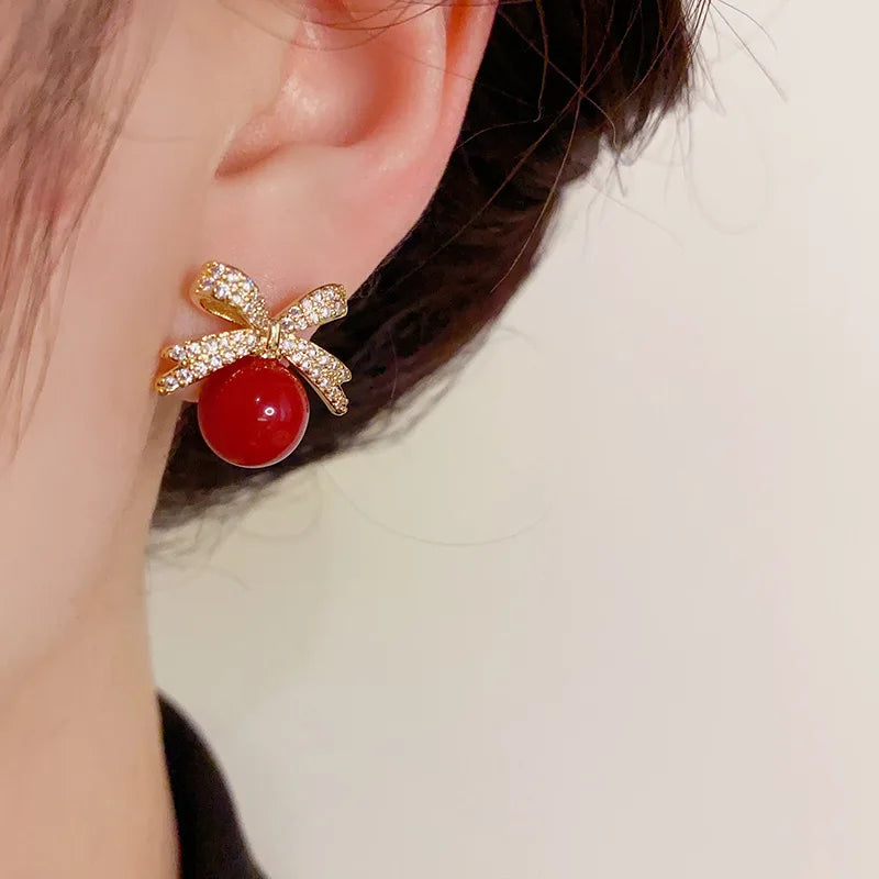 Sparkling Rhinestone Bow Pearl Stud Earrings Light Luxury