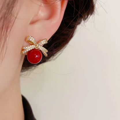 Sparkling Rhinestone Bow Pearl Stud Earrings Light Luxury