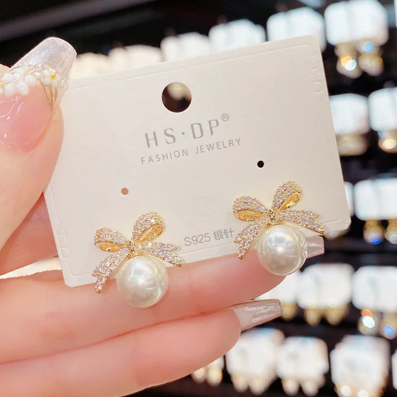 Sparkling Rhinestone Bow Pearl Stud Earrings Light Luxury